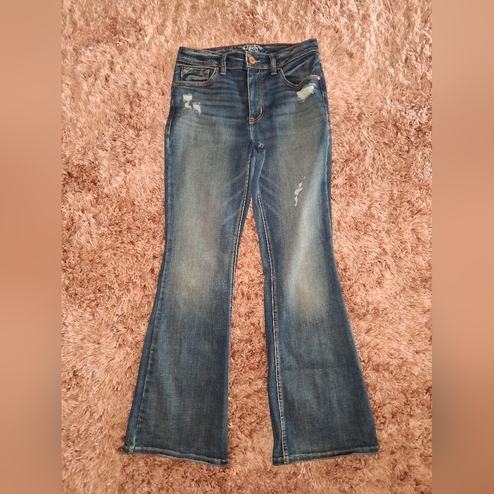 Women’s Washed Blue Flare Jeans with Light Distressing